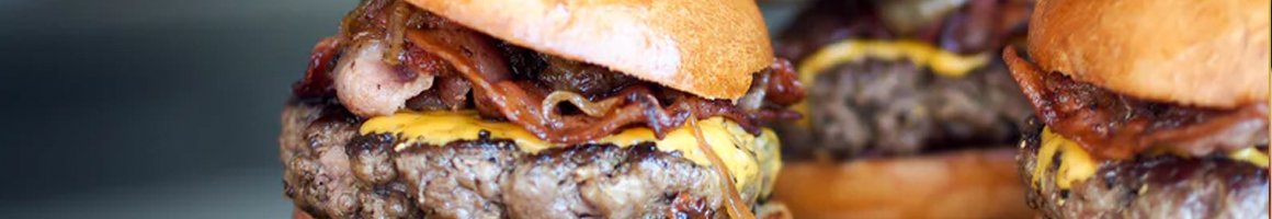 Eating American (Traditional) Burger Pub Food at Busters Restaurant and Saloon restaurant in Hollister, ID.